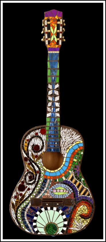 Mosaic guitar with color tiles art 
