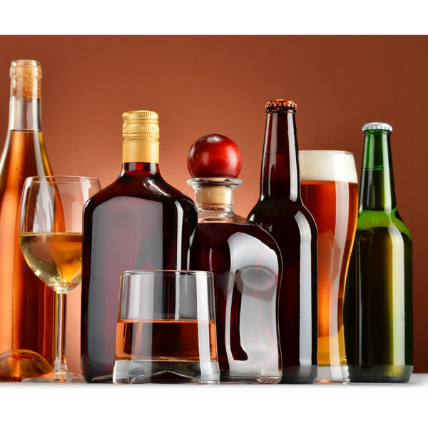 Various alcoholic beverages including wine, whiskey, beer, and a cocktail glass.