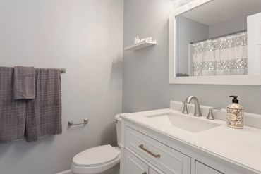 Primary bathroom with shower/tub combo.