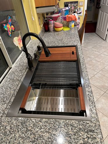 Kitchen need an update? Let us drop a shiny new sink in for you