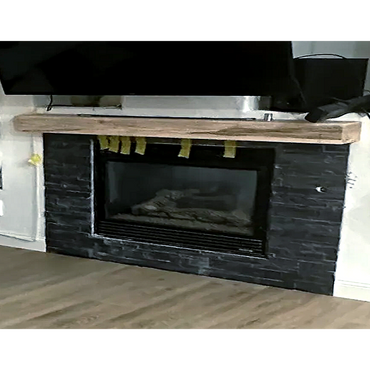 Tired of that old tile around your fireplace? Choose us to replace it with a natural stone look