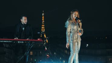 Ginta singer on the rooftop in Paris.