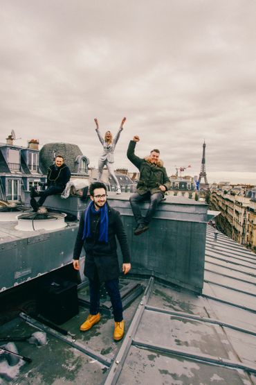 Paris rooftop, film crew members.