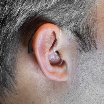 LEVELUP hearing aid with a slim tube inside a man ear