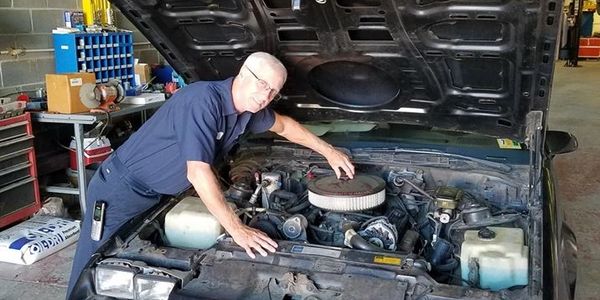 Owner Matt Wright repairing a vehicle in the Springfield Virginia garage