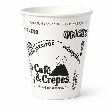 Coffee cup from Café & Crêpes with mountain-themed design and menu items.