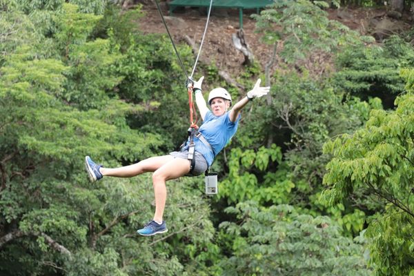Flying through the air on one the amazing canopy tours