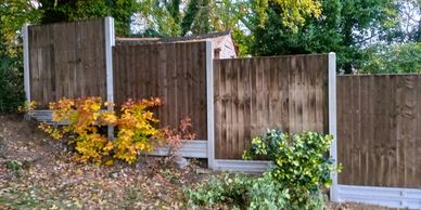 Concrete Slotted Posts Oakham with Closeboard Panels