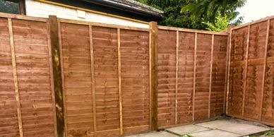 Overlap Fence Barnack Panels with Wooden Posts