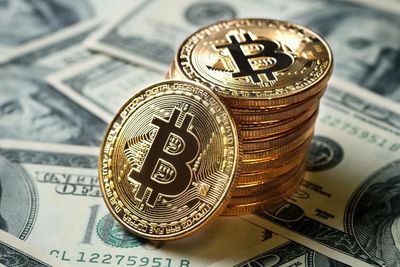 Physical Bitcoins on top of dollars