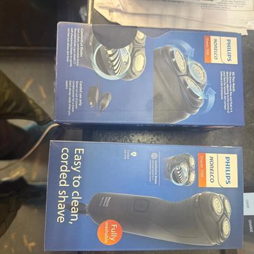 Philips Norelco Shaver 1100 with corded use and easy cleaning features.