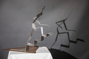 # JS004 - Flat Android Steps Up
Overall: 26”x 26”x7”
Base: 21”x16.5”
$2300