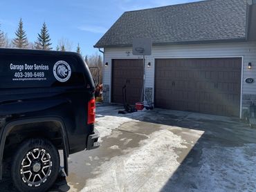 Another residential garage door installed in RockyView County