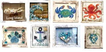 Decorative sea-themed framed art with shells, crabs, and anchors.