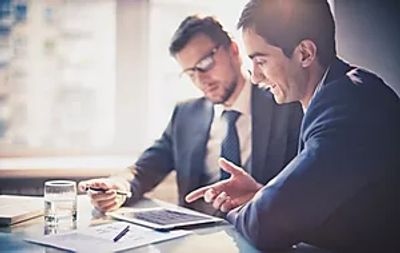 Realtor reviewing home listing agreement