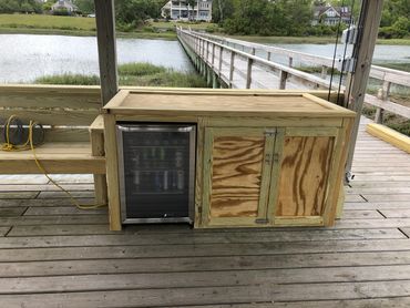 dock storage, mini refrigerators, fishing rod holders, cleats, dock seats, lights, fans , beer.