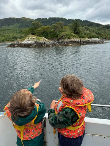 Kids on a boat on Loch Sunart