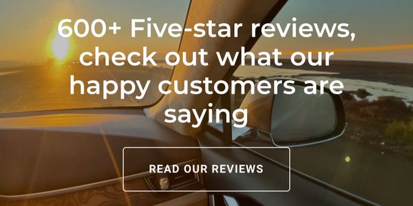 Text overlay that reads 600+5 star reviews on the backdrop of a vehicle driving into the sun