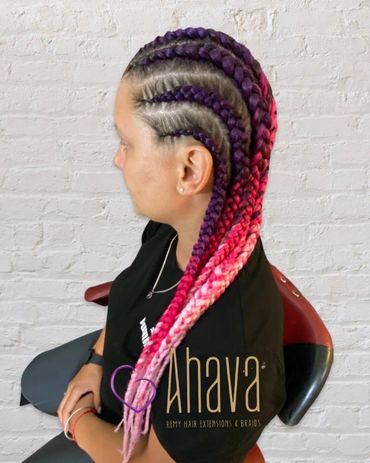 Side view of vibrant purple to pink braided hair extensions on a woman.