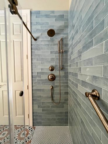 This is a perfect example of our custom plumbing projects featuring a two head system.