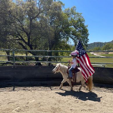 a boy learning horse riding