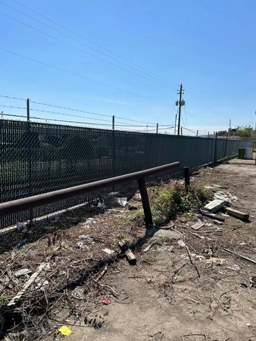 6' Barbwire Chain-Link Fence with privacy slats installed in Galveston TX | A-1 Access & Fence