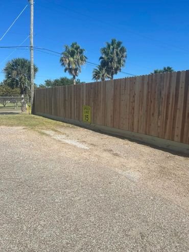 8' tall cedar fence installed in Galveston TX | A-1 Access & Fence