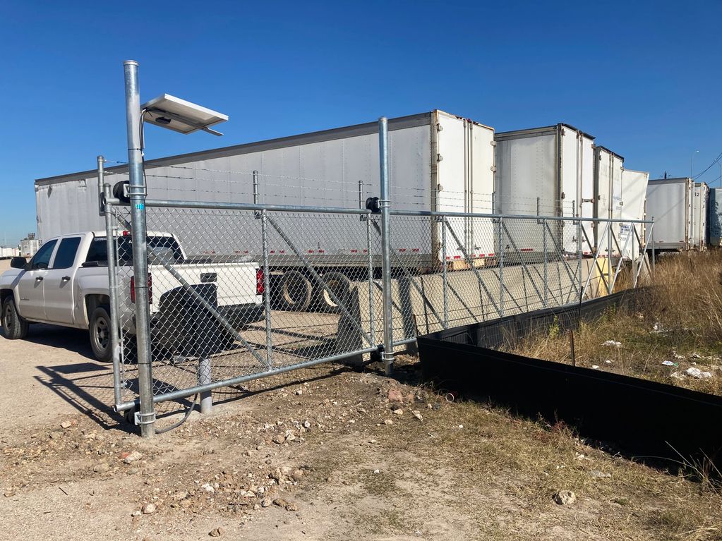 7' Commerical barbwire chain-link fence installed in Houston, TX | A-1 Access & Fence.