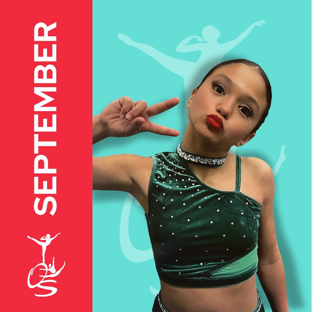 On stage dancer ofc the month in a dance costume