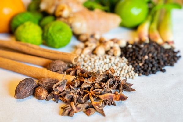 Some different types of spices on a white sheet