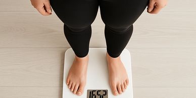 person standing on a scale
