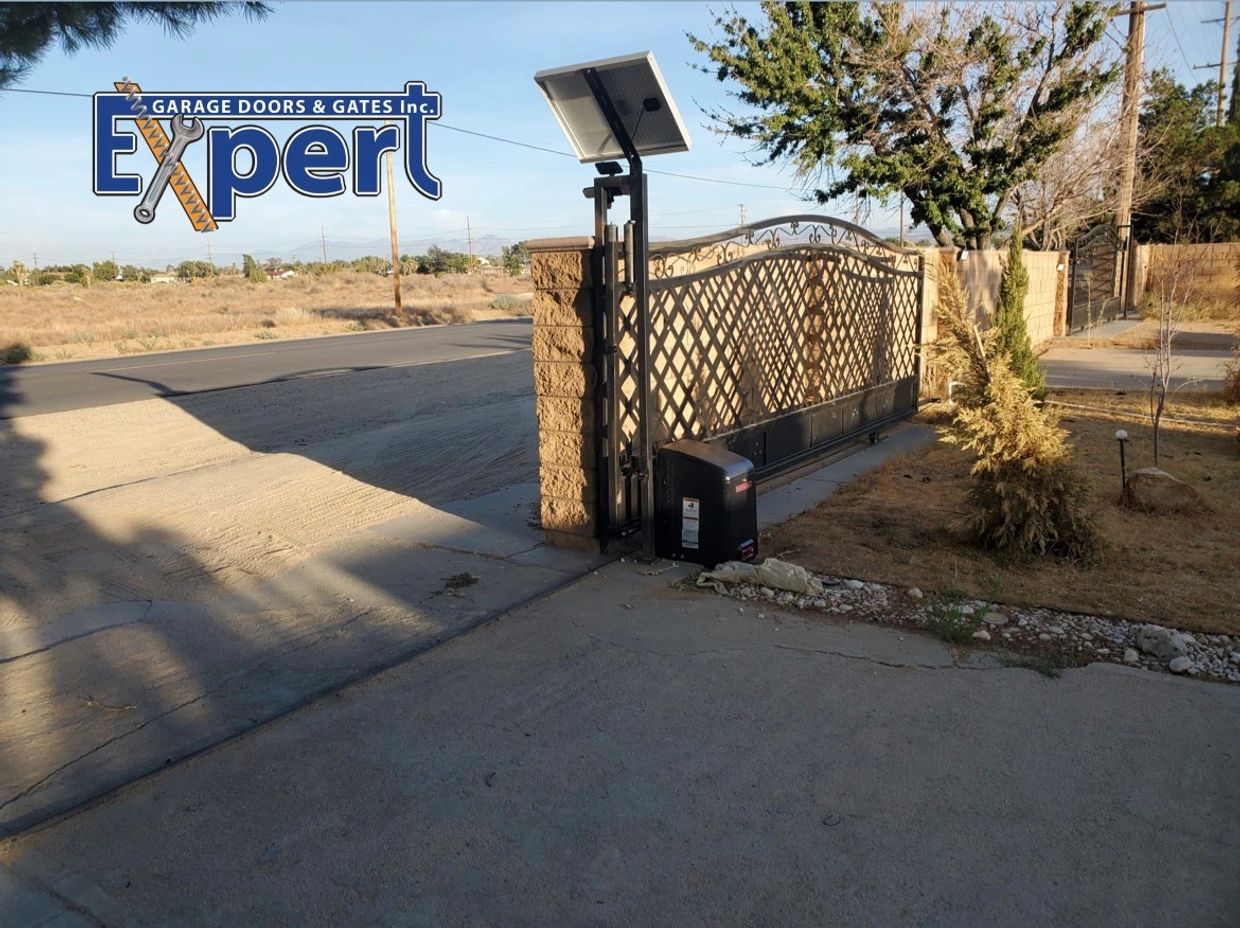 Driveway large black solar panel operated automatic metal gate. With solar panel and gate operator.
