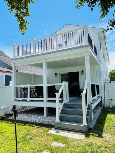 Vacation Rentals in Cape May premier rental - the Bay Breeze - Covered deck off mster bedroom