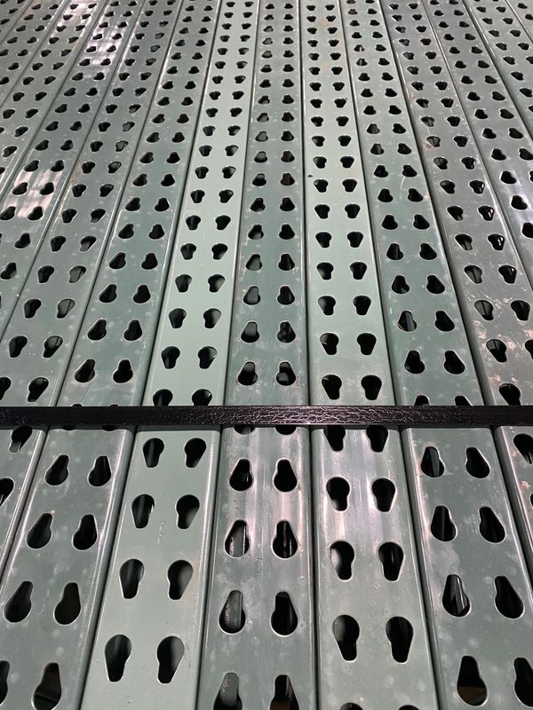 Close-up of metal perforated panels.