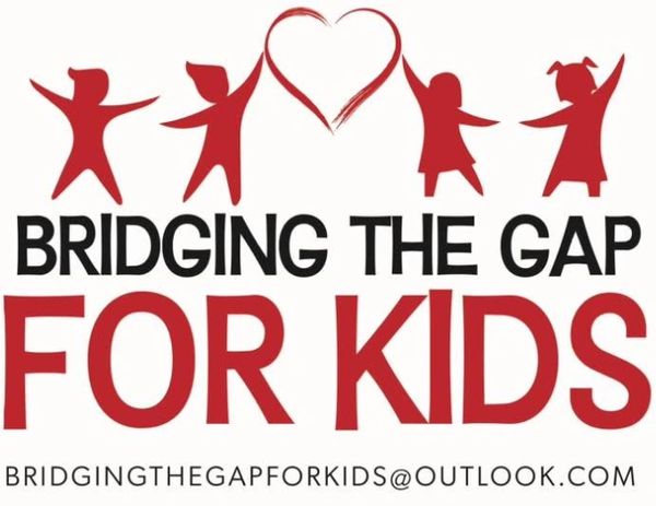 Logo for Bridging the Gap for Kids with heart and kid silhouettes.