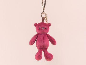 Bright pink teddy charm