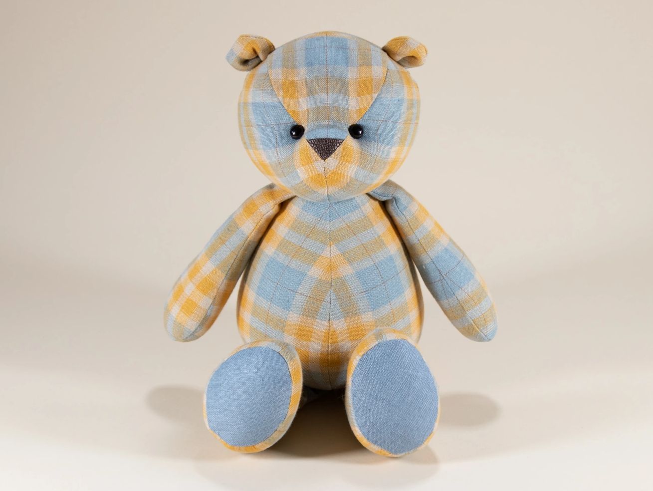 Checkered yellow &n blue teddy bear
