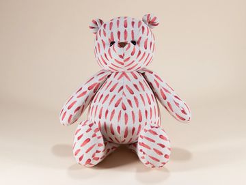 Red feather pattern teddy bear
