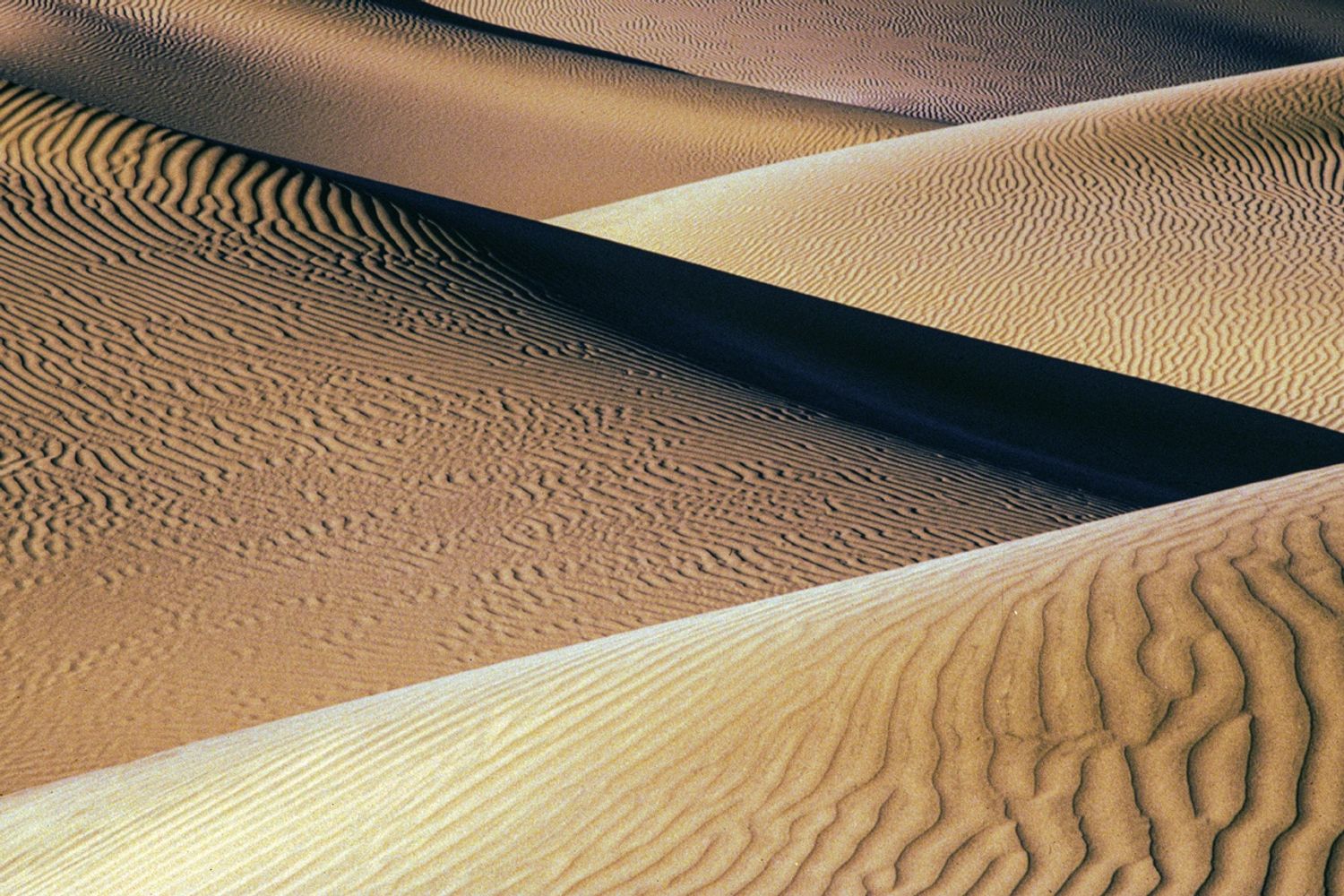 Overlapping sand dunes in Death Valley, California