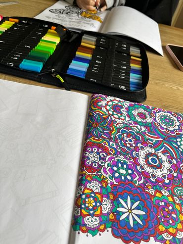 Mindful colouring session mum and daughter