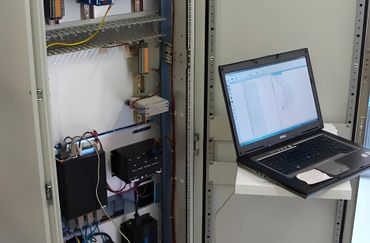 Laptop connected to control panel.