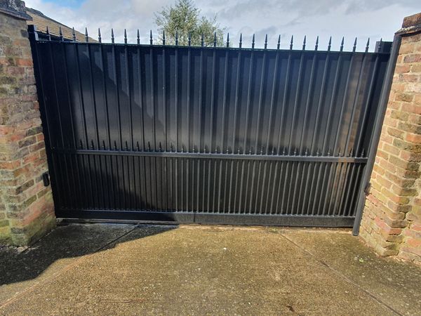 Steel sheeted driveway gates London manufactured for secure residential property entrances