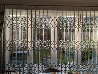 Shopfront collapsible gates London professionally fitted for secure retail property access