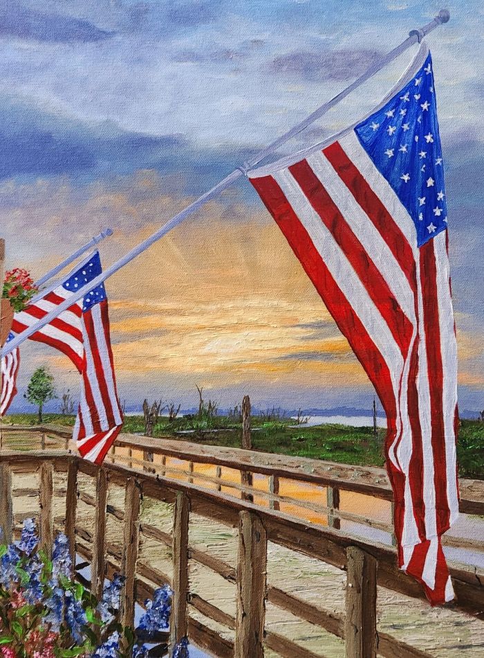 Three adults focused on drawing portraits on easels in an art class.