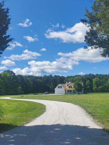 Freshly graded driveway with new stone.