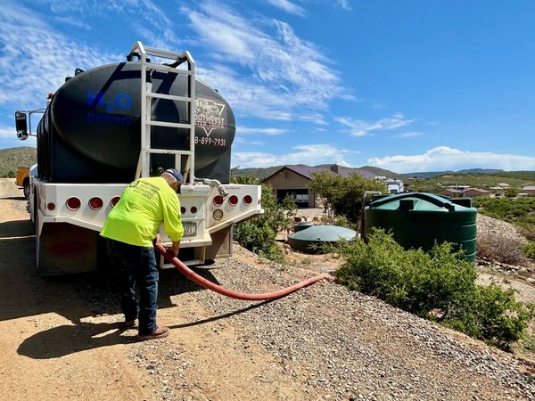 H2O Delivery setting up the hose for a tank fill