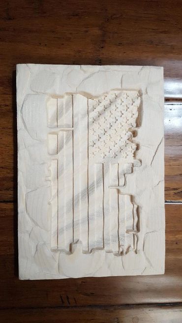 American Flag with Rock Boarder Wood Carving