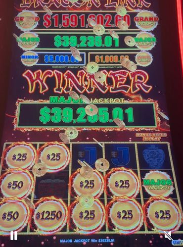 Casino slot machine screen showing a major jackpot win of $39,235.01.