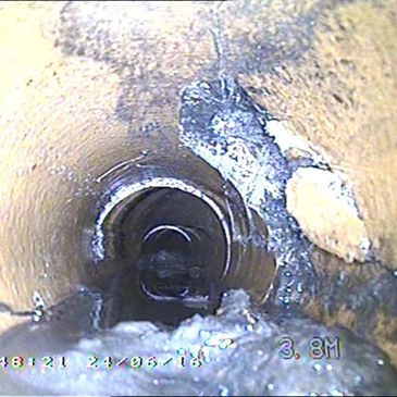 Partial drain collapse and cracking