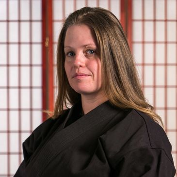 Kerri Mikita is the owner of California Karate Academy. She is a 4th degree black belt, or Master.